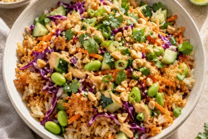 Crispy jasmine rice with cabbage, carrot, cucumber, edamame and peanut-chili dressing.